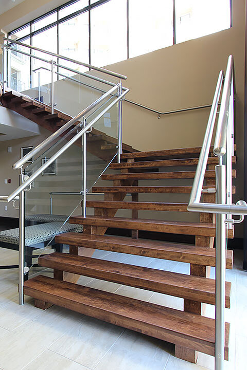 Modern Staircase with Hardwood Treads & Glass