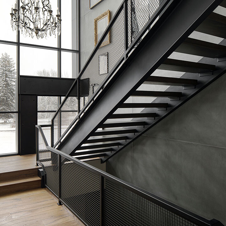 open-riser metal stairs with mesh panels