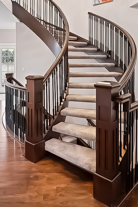 wood framed open rise curved stairs